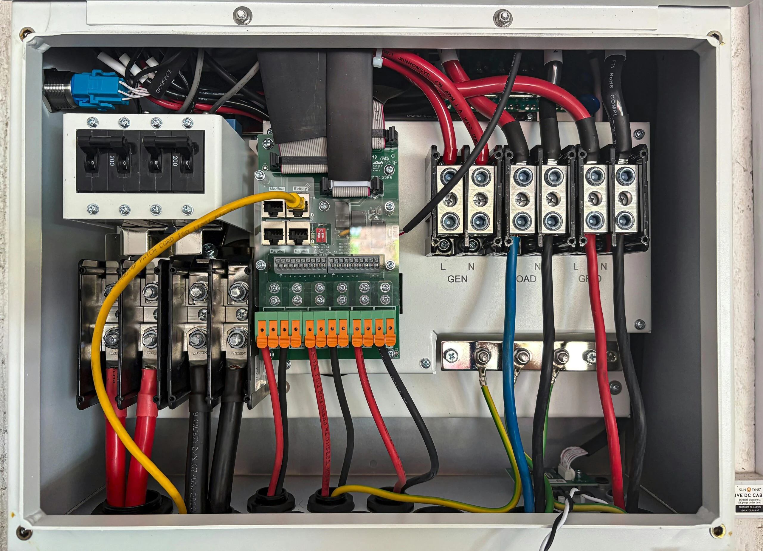 Electrical components and wiring in a circuit board, showcasing maintenance essentials from Kazar's Electric for safety.